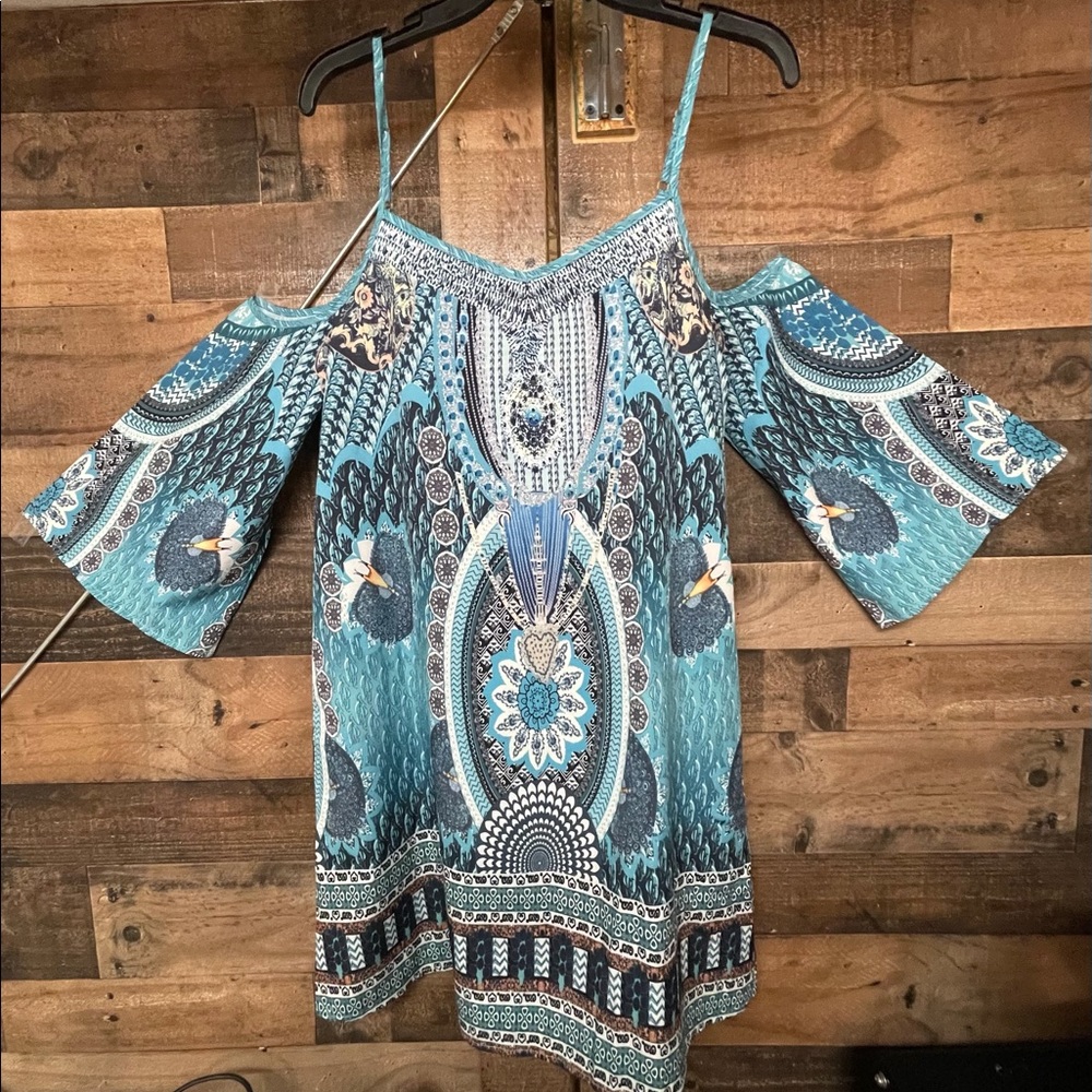 Beautiful dress. NWT. Can be worn alone or paired with leggings.